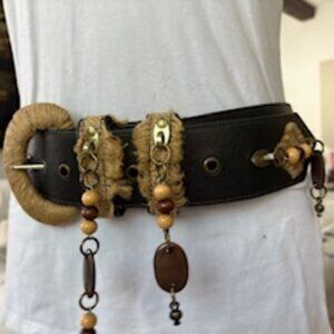 Beautiful wide leather belt with burlap detail.